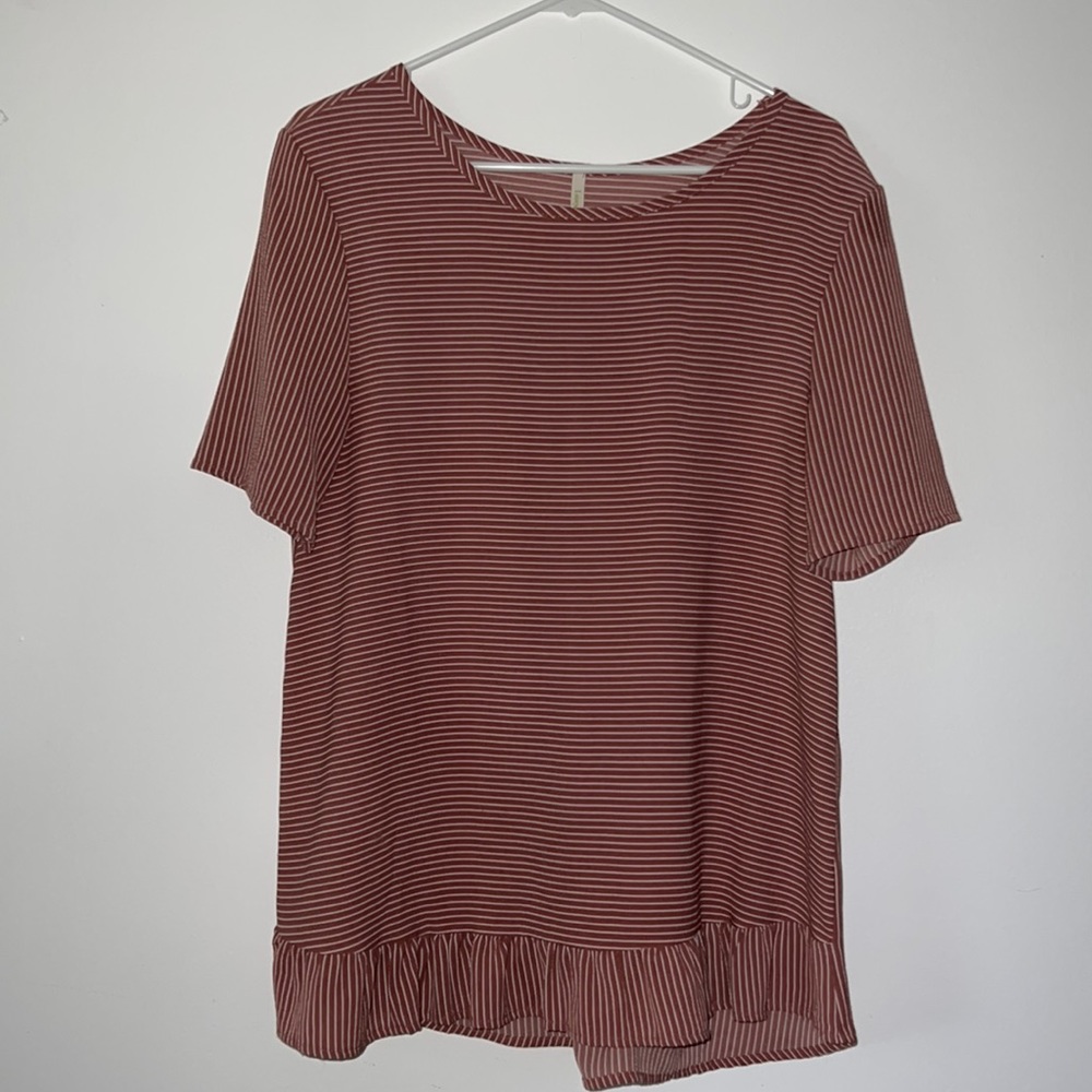 Striped blouse with ruffle bottom